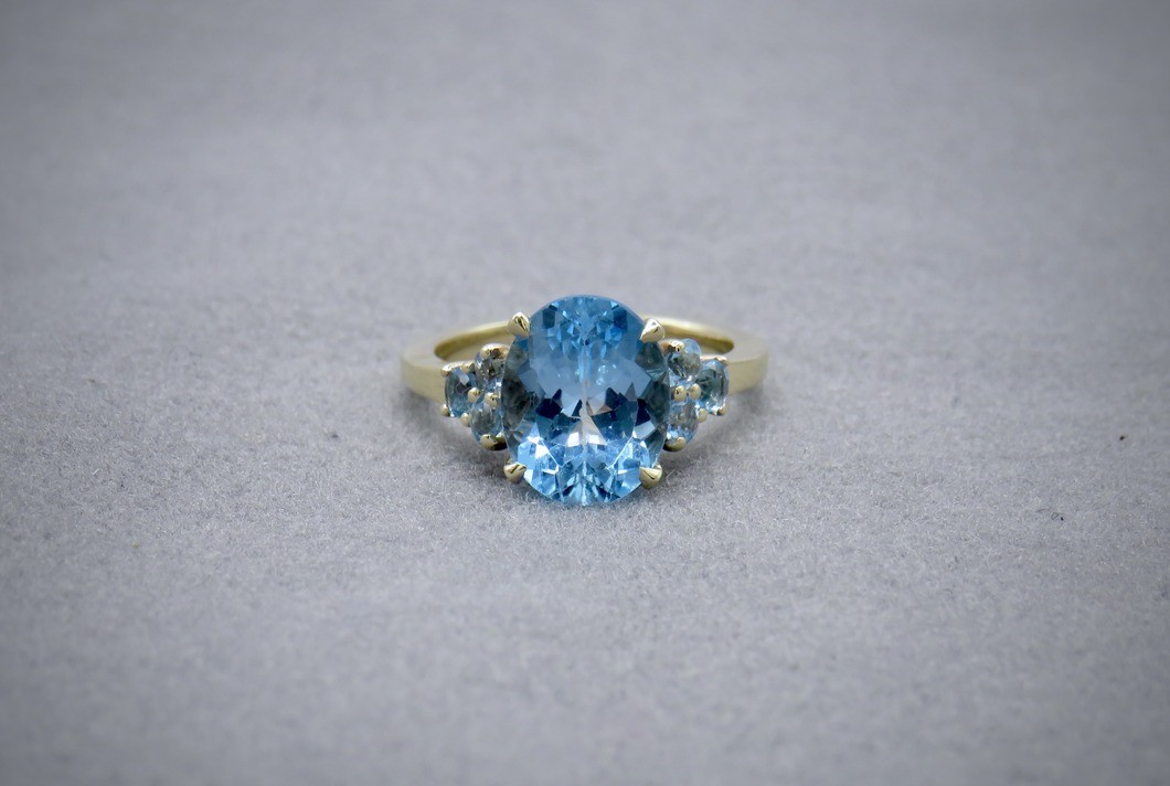 topaz and aquamarine ring in yellow gold