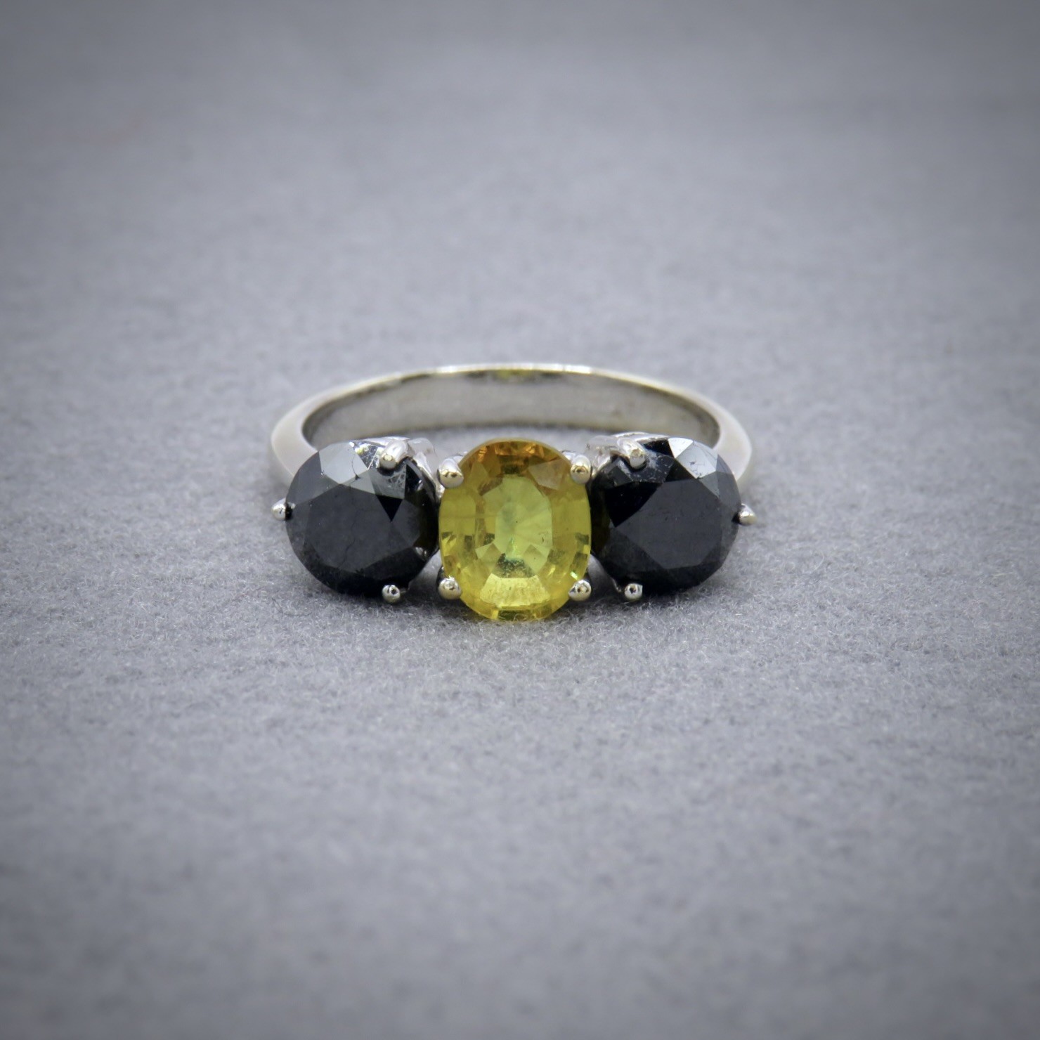 yellow sapphire and black diamond trilogy ring