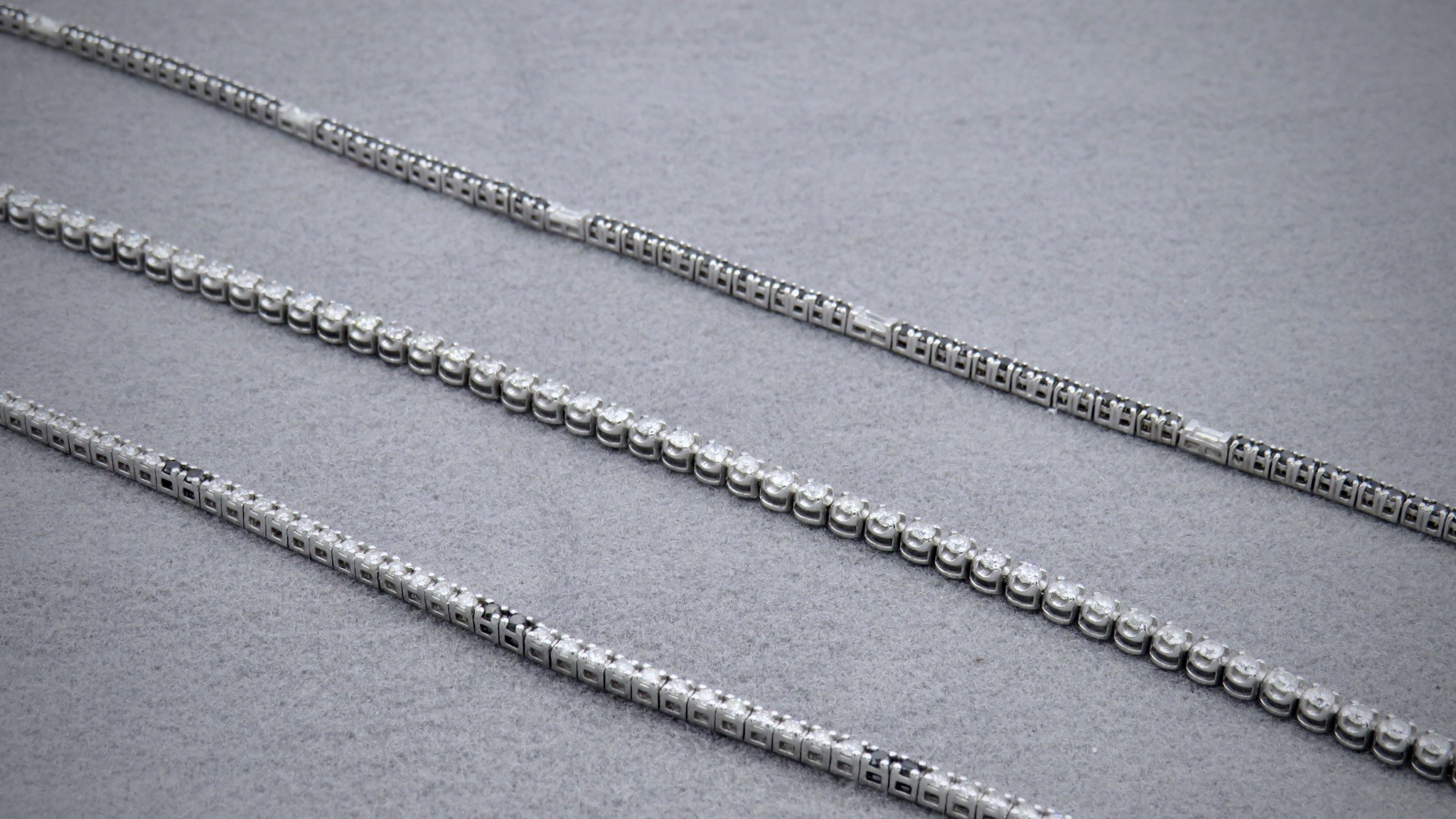 three diamond tennis bracelets